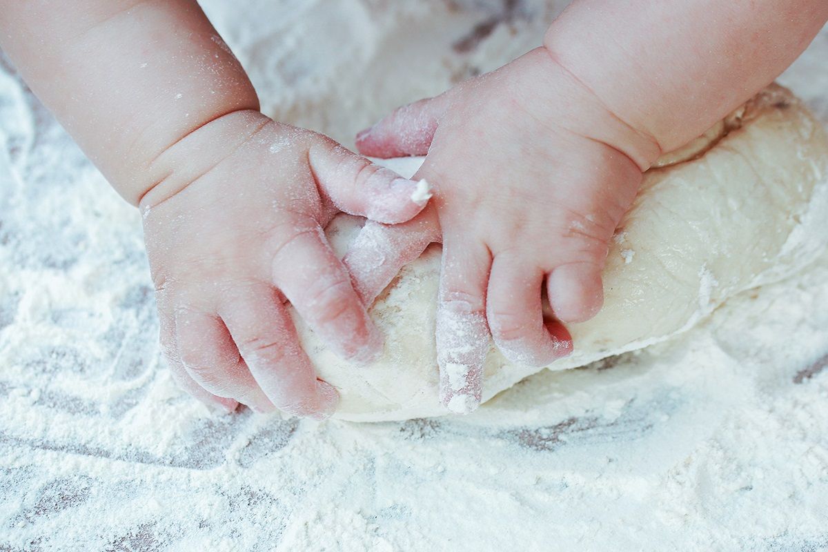Baby hands in flour